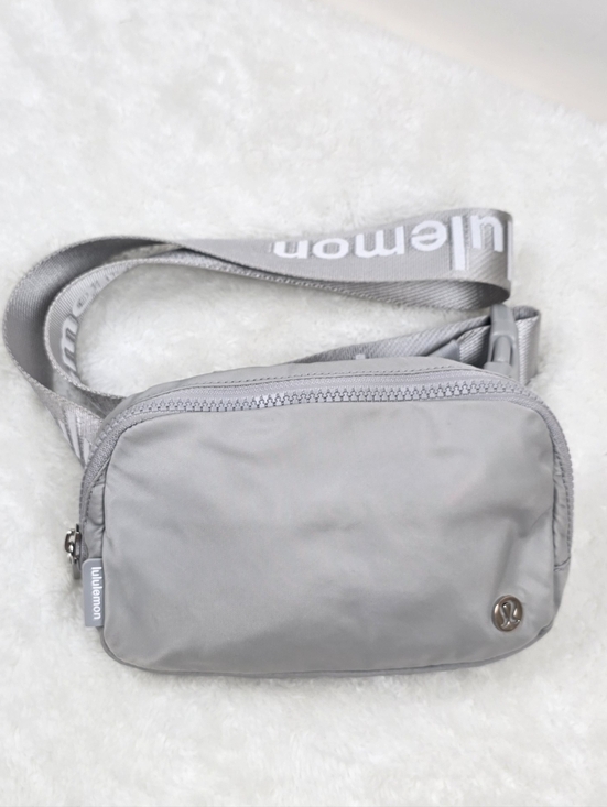 lululemon athletica Handbags - Lululemon Everyday Belt Crossbody Fanny Bag Silver Drop And White Logo 1L